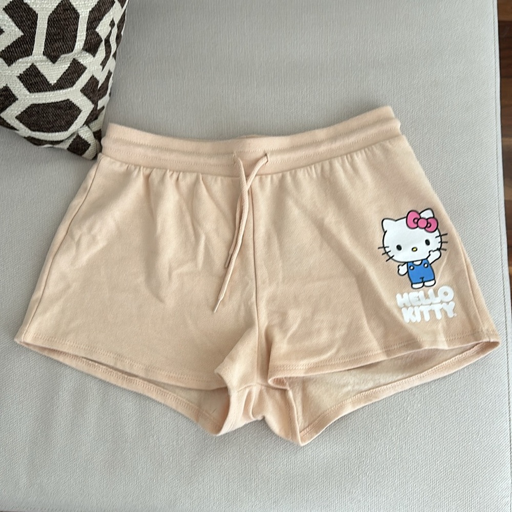 HELLO KITTY CREAM DRAWSTRING WAIST SHORTS HAVE GRAPHIC DESIGN ON FRONT JUNIOR S